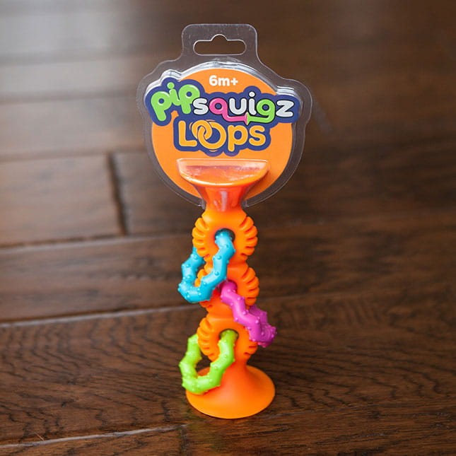 Grzechotka - przyssawka pomarańczowa  - Fat Brain Toys