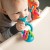 Grzechotka - przyssawka pomarańczowa  - Fat Brain Toys