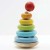 PL011-rainbow-tower-rings-being-added-to-stand.jpg