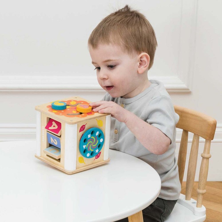 PL105-petit-activity-cube-toddler-playing-with-bird-maze.jpg