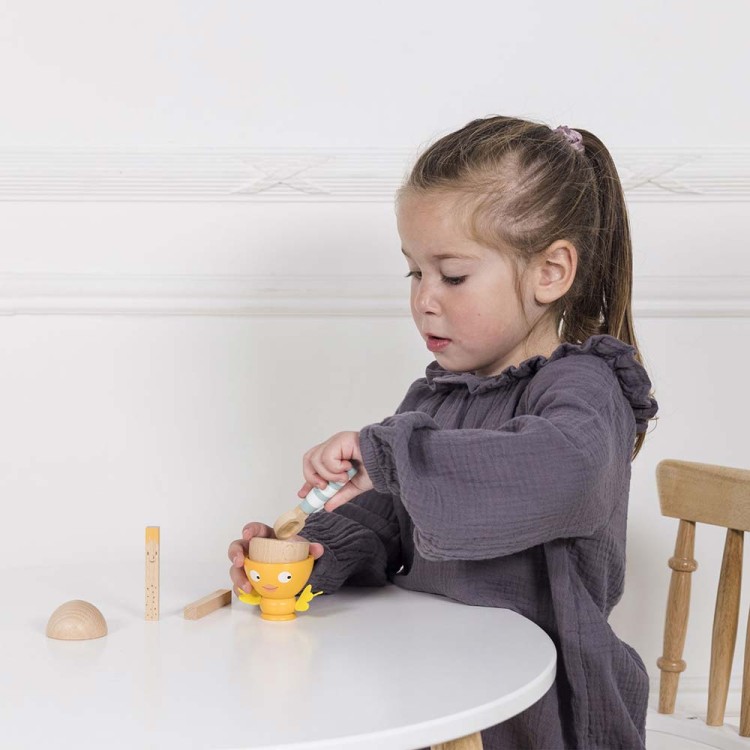 TV315-child-using-spoon-on-the-egg-and-cup-set.jpg