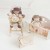 TV598-doll-baby-set-plush-dolls-sitting-in-highchair-cot.jpg