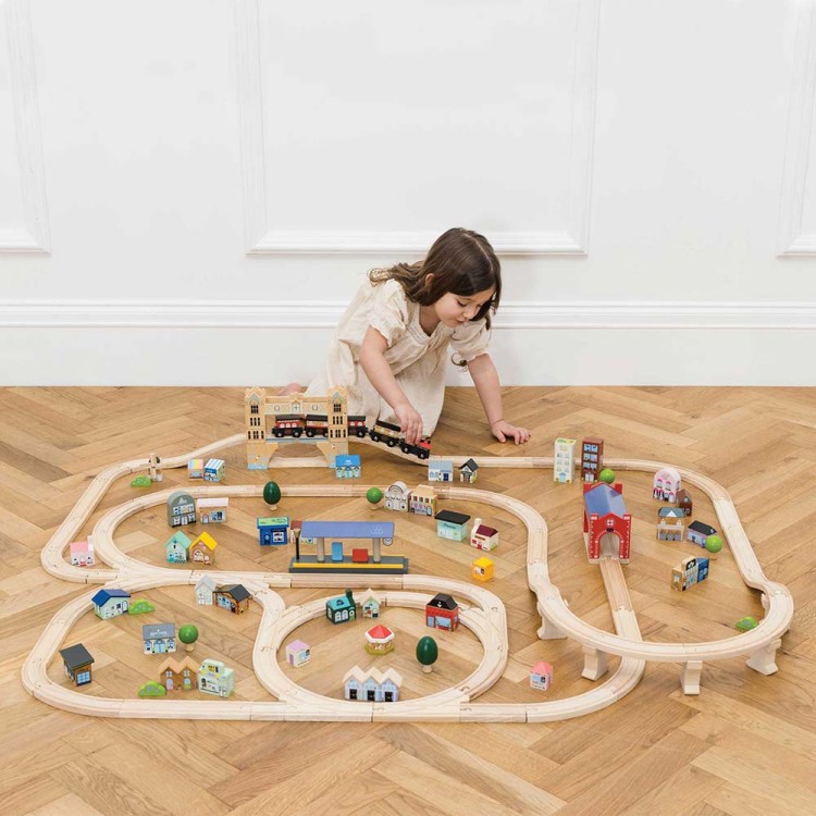TV701-city-set-girl-playing-with-red-train.jpg