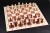 No6_mahogany_sycamore_light_border_notation_chessmen.jpg